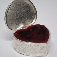 Brand New And In Excellent Condition - Silver Red Velvet-Lined Heart-Shaped Trinket Box. Measures Approximately 3in X 3in X 1.5in. The Silver Heart On The Lid Is Engravable. All My Items Come From A Clean, Smoke Free Home. Have Questions" Need Measurements? Please Ask, I'm Happy To Help! See Something You Like? Please Feel Free To Bundle Any Of My Items And I Will Make You An Offer! Black Ring Box, Wedding Types, Source Unknown, Treasure Hunt, Heart On, I'm Happy, Ring Box, Silver Heart, Trinket Boxes