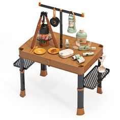 a wooden table topped with lots of different types of items on top of each other