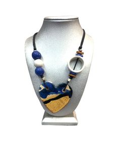 Handmade ceramic necklace made by local artisan with adjustable cord up to 16 inches. Perfect for any outfit or any ocasion. Artisan Blue Adjustable Necklace, Ceramics Necklace, Artisan Hand Painted Adjustable Necklace, Ceramic Bead Jewelry Necklaces, Ceramic Necklace Novica, Ceramic Necklace, Local Artisans, Handmade Ceramics, Statement Necklace