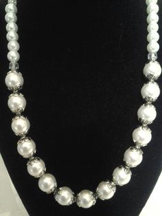 This elegant set can be great for weddings as well Elegant Pearl White Round Jewelry Sets, Formal Silver Pearl Jewelry Sets, Elegant Metal Jewelry Sets, Elegant Round Metal Bridal Necklace, Elegant Adjustable Jewelry For Evening, Elegant Evening Beaded Metal Necklaces, Elegant Evening Metal Beaded Necklaces, Elegant Evening Metal Beaded Necklace, Elegant Pearl White Jewelry Sets For Formal Occasions