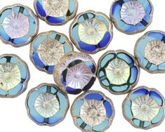 blue and silver glass flowers on white background