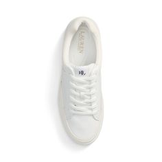 Inspired by tennis shoe designs the Hailey sneaker unites sumptuous leather with soft suede trim. Accented with an “LRL” logo at the tongue for signature style this shoe features an exclusive grooved foam footbed engineered to evenly distribute weight to ensure the utmost comfort with each step. Classic Lace-up Tennis Sneakers, Classic Tennis Sneakers With Cushioned Footbed, Classic Low-top Golf Shoes With Cushioned Footbed, Tennis Sneakers With Cushioned Footbed And White Sole, Classic Low-top Cushioned Golf Shoes, Classic Cushioned Tennis Sneakers, Tennis Sneakers With Cushioned Footbed, Lace-up Tennis Sneakers With Cushioned Footbed, Cushioned Lace-up Tennis Sneakers