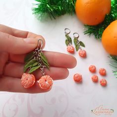 Winter earrings gift Tangerine earrings Orange mandarin earrings gift Mandarin fruit earrings Mandarin jewelry gift Food citrus earring gift Mandarin earrings will be a perfect decoration for a winter day or evening  These citrus earrings will be great Christmas gift  Earring length 5.5 cm /2.16 Inches Mandarin diameter approx 1.3cm / 0.51 Inches ✿ I can make more than one pair of earrings. Please contact me if you need several earrings ✿ ✿ THESE EARRINGS ARE READY TO SHIP! ✿ Real colors may slightly differ from one monitor to another, as it depends on specific monitor settings. ✿All my jewelry packed in a gift box ♥ Thank you for visiting my shop.♥ *To see more items please click here: http://etsy.me/2nnrK5N *Before shopping, don't forget to read my Policies: http://etsy.me/2nspiYK Orange Jewelry With Fruit Design For Gifts, Orange Fruit Design Jewelry For Gift, Orange Fruit Design Jewelry Gift, Fruit Design Drop Earrings As Gift, Fruit Design Drop Earrings For Gift, Orange Dangle Earrings For Gift, Orange Earrings With Ear Wire For Gift, Orange Drop Earrings For A Gift, Orange Fruit Design Earrings As Gift