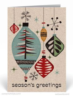 a christmas card with ornaments hanging from it's sides and the words season's greeting