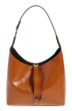 This slouchy calfskin-leather hobo bag blends a modern aesthetic with a '70s folk spirit, and of course has the Marcie line's signature slip-tassel closure. Bridge-tassel closure Shoulder strap Interior zip wall pocket Protective metal feet Leather Made in Italy Designer Handbags This brand has B Corp certification, representing business practices with emphasis on social and environmental performance, accountability and transparency This brand meets Nordstrom Responsible Brands criteria: brand a Modern Cognac Hobo Bag With Leather Lining, Modern Brown Calf Leather Hobo Bag, Chic Leather Hobo Bag For Work, Brown Calf Leather Hobo Shoulder Bag, Leather Hobo Bag For Work In Fall, Chic Brown Calf Leather Bucket Bag, Modern Soft Leather Hobo Bag In Cognac, Modern Cognac Soft Leather Hobo Bag, Workwear Soft Calf Leather Hobo Bag