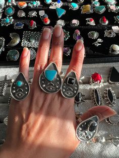 "EVIL EYE RINGS, MAXI RINGS TRAY RINGS AUTHENTIC GEMSTONES HAND CRAFTED GENUINE STERLING SILVER FROM MEXICO RIGS ARE ADJUSTABLE IN SIZE, SO YOU CAN SWITCH FINGERS!! BEAUTIFUL HIPPIE/BOHO STYLE Approx. measurements :  Rings are abouth 1 3/4\" H  x 1\" L OR SO, PLEASE KEEP IN MIND THAT RINGS ARE MADE ONE AT THE TIME SO THEY MAY VARY IN SIZE OR FINISH... You will receive your ring in a beautiful mini organza OR black velvet pouch  Final sales Thanks for visiting. Please dont forget to follow us on Rings Tray, Rings Hippie, Eye Rings, Turquoise And Black, Evil Eye Ring, Eye Ring, Velvet Pouch, Genuine Turquoise, Small Heart