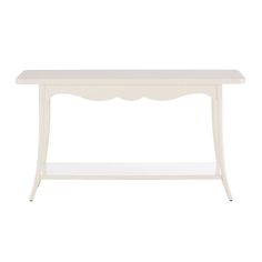 a white console table with scalloped edges