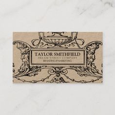 a business card with an ornate design on the front and bottom, which reads taylor smith