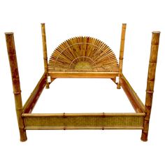 a bamboo bed frame with fan shaped headboard