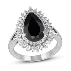 Make a glamorous statement with this gorgeous gemstone ring. Created in sterling silver, this choice showcases a 14.0 x 8.0mm pear-shaped rich black onyx embraced by a double shadow frame of baguette-cut and round shimmering white lab-created sapphires. A split shank completes the look. Buffed to a brilliant luster, this ring complements your luxe taste. Custom-made to fit her ring size. Sterling silver rings cannot be resized after purchase. Pear-shaped Gemstone Jewelry For Evening, Teardrop Gemstone Ring For Formal Occasions, Black Drop Jewelry For Anniversary, Elegant Pear-shaped Sterling Silver Rings, Elegant Pear Shaped Rings With Accent Stones, Elegant Teardrop Jewelry With Accent Stones, Classic Black Pear-shaped Jewelry, Silver Pear-shaped Rings For Formal Occasions, Elegant Teardrop Rings With Polished Finish