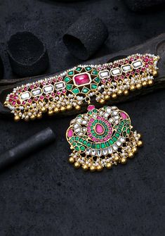 Experience the exquisite design aesthetics of our land's temple jewelry, designed by skilled karigars from centuries past. The statement patterns remain relevant to date and feature hand-set gemstones and intricate designs, bringing timeless elegance and beauty to those who wear them. Height-98 mm,Width-135 mm Note: Please note that there are no returns, exchanges or cancellations on precious pearls and other jewelry items. The necklace comes with a dori by default.  Should you need a 925 back c Ornate Dual-tone Jewelry For Festivities, Ornate Dual-tone Jewelry For Festive Occasions, Ornate Dual-tone Jewelry For Festive Season, Traditional Dual-tone Pendant Jewelry, Festive Dual-tone Temple Necklace For Rituals, Dual-tone Jewelry For Navratri Rituals, Dual-tone Kundan Chandbali Temple Necklace, Dual-tone Chandbali Kundan Temple Necklace, Dual-tone Chandbali Temple Necklace For Festive Season