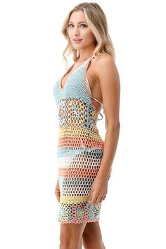 Final Sale - Get it before it's gone! You'll be ready for the beach in the Mindy Pink and Blue Sheer Crochet Swim Cover-Up! Alternate rainbow crochet knit (with stripes and grandma crochet squares) shapes this cute swim cover-up (in hues of pink, blue, ivory, and yellow) with a halter neckline, sleeveless bodice, and mini skirt with scalloped hem. Layer over your favorite bikini for a cute beachy look! DETAILS & FIT Bodycon Fit. Cotton. Hand wash cold. Imported. ORDERS, SHIPPING & RETURNS Orders Multicolor Crochet Dress For Vacation, Multicolor Crochet Top For Spring Beach Cover-up, Multicolor Beachy Crochet Dress For The Beach, Multicolor Crochet Beach Dress For Summer, Multicolor Crochet Dress For Beach In Spring, Multicolor Crochet Dress For Spring Beach Outings, Multicolor Crochet Dress For Spring Beach Occasion, Multicolor Crochet Dress For Spring Beach, Bohemian Multicolor Crochet Dress For Beach