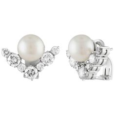 Stunning Chevron Earrings The earrings are 18K White Gold There are 2.50 Carats in Diamonds F/G VS There are 9.00mm Cultured Pearls The earrings measure 0.75" x 0.50". The earrings weigh 12.0 grams