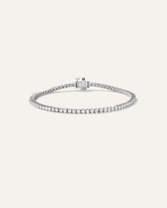 Elevate your everyday elegance with our stunning lab grown diamond tennis bracelet, featuring a classic 4-prong design that showcases each stone's brilliance. Available in two lengths and five different total carat weight options, this bracelet allows you to customize your perfect fit and desired level of sparkle. The secure box clasp with safety closure ensures your precious piece stays firmly in place, making it ideal for daily wear without worry. Timeless Diamond Tennis Bracelet With Round Cut, Timeless Diamond White Tennis Bracelet With Round Cut, Timeless Diamond Tennis Bracelet, Timeless Round Cut Diamond Tennis Bracelet, Moissanite Jubilee Tennis Bracelet In Fine Jewelry Style, Moissanite Jubilee Tennis Bracelet Fine Jewelry, Moissanite Jubilee Tennis Bracelet, Elegant Round Tennis Bracelet With Lab Grown Diamonds, Elegant Tennis Bracelet With Lab Grown Diamonds