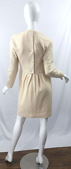 For Sale on 1stDibs - I had this chic vintage GEOFFREY BEENE for Bergdorf Goodman dress once, and it sold right away ! There are so many details that went into designing this Elegant Beige A-line Vintage Dress, Elegant A-line Vintage Dress With Buttons, Elegant A-line Vintage Dress For Daywear, Chic Fitted Vintage Dress In Beige, Cream Formal Dress With Buttons, Chic Fitted Beige Vintage Dress, Formal Cream Dress With Buttons, Fitted Cream Vintage Dress Chic Style, Chic Fitted Cream Vintage Dress