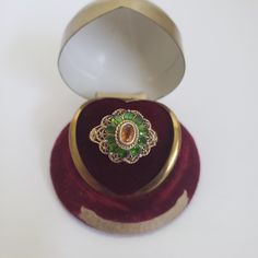 Vintage baroque rococo style dinner ring. Yellow and green simulated gemstones in an ornate setting with floral details on the shank. 925 silver ring with gold vermeil overlay. Marked 925 and an A or FA in a circle.  Size US 9 3/4. The ring face diameter is 5/8".  Previously owned. There are subtle signs of age/use. The pictures are part of the description. The presentation box is not included in the sale.  Do browse our other items. We combine shipping for savings. Purchasers can contact the sh Ornate Gold Cabochon Rings, Antique Collectible Cluster Ring, Victorian Yellow Gold Cabochon Ring, Victorian Cluster Ring In 14k Gold, Oval Shaped, Victorian Multi-stone Ruby Ring In Gold, Dinner Ring, The Ring Face, Style Baroque, Rococo Style