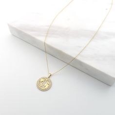 "\"World Map Pendant | 14k Gold Globe Pendant, World Continents Gold Necklace, Bezel Gemstone Setting, Gift for Overseas | Gift for Her\" ◖ P R O P E R T I E S ◗ * Material: 14k Yellow Gold, 14k White Gold * Gemstone: Zircon * Weight: gr (2,37for 17\", ±5%) * Necklace Length: 14\" - 22\" // 35,6cm - 55,9cm (±1/4\", Please contact me for different sizes) ◖ D I O N J E W E L ◗ ‣ 14K REAL GOLD ‣ EXPRESS DELIVERY IN 1-3 DAYS* ‣ HANDMADE ONLY FOR YOU, NO USED JEWELRY ‣ GIFT BOX, POUCH AND OTHER GIFTS Diamond Coin Necklace Gift, Diamond Coin Necklace For Gift, Diamond Round Coin Necklace For Gift, World Continents, Gemstone Setting, Gold Globe, Map Pendant, Box Pouch, Coral Jewelry