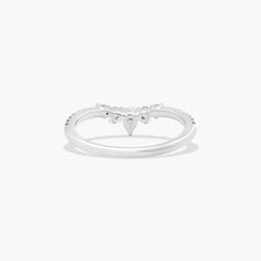 a white gold ring with two hearts on it