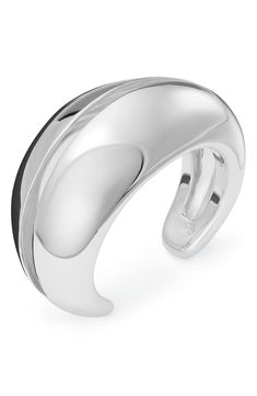 Perfect to stack or wear solo, a grooved wave cuff bracelet catches the light with a high-shine finish. 1 1/2" width Silvertone plate Imported Polished Finish Cuff Bracelets For Formal Occasions, Classic Open Band Cuff Bracelet With Polished Finish, Elegant Thick Band Bangle With Polished Finish, Sleek Polished Bangle Jewelry, Sleek Polished Bangle Bracelet, Modern White Gold Bangle With Polished Finish, Luxury Polished Cuff Bracelet, Luxury Cuff Bracelet With Polished Finish, Luxury Polished Wide Band Cuff Bracelet