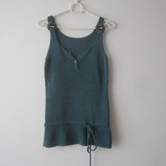 "Vintage Knitted Top Sleeveless Sea blue - green Top Small Size Top Romantic Summer Top Knitted Spaghetti Straps Comfortable Top  Estimated size: M Measurements (lying flat): Bust: 15.5\"/ 39.3 cm Width: 14\"/ 35.5 cm Length: 25.5\"/ 65 cm Please check measurements to insure a proper fit. Remember to allow yourself some extra room for movement. You can compare these with something from your closet that fits you well. This sweater will come to you freshly laundered and ready to wear. Please feel free contact me if you need additional measurements or have any questions Condition: great Vintage Condition SHIPPING * I ship worldwide via Priority mail (Latvijas Pasts) from Latvia (EU). * I ship from Europe, so please allow 2 to 4 weeks for the package to arrive if you live overseas. * Europe 5 Green Knit Tank Top For The Beach, Green Knit Tank Top For Beach, Blue Knitted Sleeveless Vest, Blue Sleeveless Knit Crochet Top, Fitted Green Crochet Sleeveless Top, Green Fitted Sleeveless Crochet Top, Stretch Green Knit Crochet Top, Fitted Green Sleeveless Crochet Top, Green Knit Sleeveless Vest