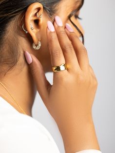 The Asante Ring is a unique gold piece that's perfect for everyday wear and layering with other rings. Its polished & irregular surfaces add a unique shiny touch to any look. Gold Open Band Rings For Everyday, Gold Open Ring Jewelry For Everyday, Everyday Gold Thick Band Jewelry, Minimalist 14k Gold-tone Ring, Gold-plated Open Band Midi Rings, Everyday Gold Wide Band Stackable Ring, Everyday Gold Dome Ring Open Design, Gold Stackable Jewelry With Wide Band, Gold Wide Band Jewelry For Everyday