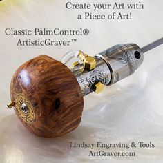 an image of a wooden object with some writing on it and the words palm control air - graver written in gold