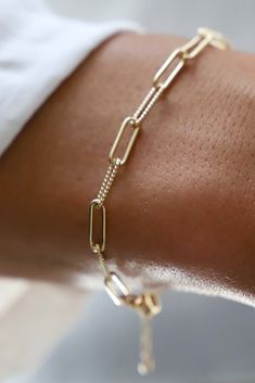 24kt gold plate elongated link chain bracelet. Smooth and textured links. -Color: Gold -Measures adjustable 6"-7 3/4" -Made in the USA Quirky Bracelets, Jewelry Styles, Link Chain Bracelet, Gold Overlay, Popular Jewelry, 24kt Gold, Gold Bracelet Chain, Pearl Pendant Necklace, Everyday Jewelry