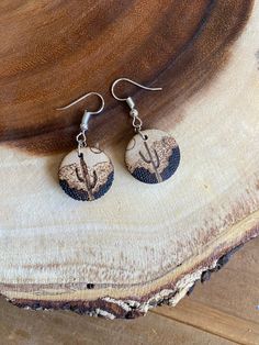 Lightweight and comfortable to wear!  Hand burned wood earrings Nickel-free earring hooks Rustic Drop Earrings With Ear Wire, Brown Wooden Round Earrings, Brown Wooden Earrings For Pierced Ears, Natural Wood Drop Earrings For Pierced Ears, Brown Wooden Drop Earrings, Brown Wood Drop Earrings, Nature-inspired Brown Earrings With Ear Wire, Natural Color Round Earrings For Pierced Ears, Natural Round Earrings