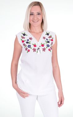 Description Style # 3206 All White but colorful. Colorful but all White. It’s what this top is. Trimmed with machine made laces on the collar, hem and armholes, embroidered with colorful flowers on the bust, this top can be combined easily with your skirts and trousers 100% High Quality Cotton All of our products are made in Turkey with care. This is a unique product. Please refer to our size chart Size Chart Bust Waist Length S 35.5" 38" 27.5" M 37.5" 40" 28" L 40" 42.5" 28" XL 42.5" 45" 28.5" Embroidered Cotton Top, Cotton Top, Waist Length, All White, Embroidered Flowers, Cotton Tops, Colorful Flowers, Floral Tops, Size Chart