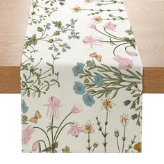 an image of a table runner with flowers on it