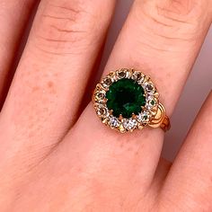 Vintage 1940's 10k yellow gold statement ring. The size of the ring is a 5.5, and has the ability to be resized. The height of the ring off of the finger is 5.5mm. The width of the band is 2.9mm, and tapers down to 1.8mm. Collectible Green 14k Stamped Jewelry, Antique Green Oval Diamond Ring, Classic Green Jewelry With Rose Cut Diamonds, Heirloom 14k Stamped Emerald Ring, Heirloom Emerald Ring Stamped 14k, Antique Emerald Ring In Stamped 14k Yellow Gold, Antique Green Diamond Ring For Formal Occasions, Antique Emerald Diamond Ring For Formal Occasions, Vintage Gold Cluster Ring With Gemstones