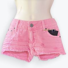 Bringing All The Barbie & Short Shorts Vibes! Made In Los Angeles, These New With Tags Distressed Shorts Are Perfect For Hot Weather. Fabulous Hot Pink Color! Frayed On Legs. 100% Cotton & Made In Usa. The First Picture On Model Against White Background Was Taken In Natural Light; It & The Next 3 Probably Show The Best Representations Of Color. The Last Two On The Table Depict A Distorted Color. Approximate Measurements: Waist (Flat) ~ 13.5” Zipper ~ 2.5" Length From One Upper Inner Leg To Other Trendy Ripped Pink Jeans, Pink Ripped Cotton Jeans, Pink Ripped Denim Jeans, Trendy Ripped Pink Bottoms, Trendy Pink Jean Shorts With Pockets, Trendy Jean Shorts With Pockets, Pink High Waist Ripped Bottoms, High Waist Ripped Pink Bottoms, Pink Jean Shorts With Pockets For Spring