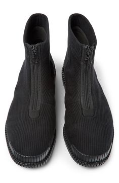 A lightweight, shock-absorbing sole adds to the everyday utility of this flexible knit boot secured with a front zip closure. Front zip closure OrthoLite® footbed Textile upper/recycled-polyester lining/synthetic sole Imported Knit Boot, Knit Boots, Boots Men, Nordstrom, Knitting, Boots, Black, Design