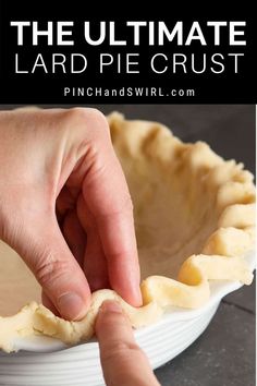 a person placing an uncooked pie crust on top of a pie pan with text overlay that reads the ultimate hard pie crust