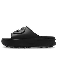 Embrace freedom of expression with these Gucci Interlocking G slide sandals. Crafted from black rubber, they feature an embossed Interlocking G detail and a rubber sole. The low heel measures 42mm and the sandals are made in Italy. Freedom Of Expression, The Low, Black Rubber, Stylish Sneakers, Low Heels, Slide Sandals, Black Sandals, Perfect Pair, Rubber Sole