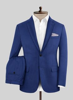 Make a bold statement with our Royal Blue Suit, a mix of impeccable style and unparalleled quality. Expertly crafted from a luxurious wool blend, this suit offers a sleek silhouette and a striking royal blue shade that commands attention. Perfect for making an impression at the office or captivating at special events, our blue suit ensures you're always the best dressed in the room. Experience perfect luxury and comfort, and make every moment an occasion to remember. Elevate your wardrobe today Elegant Royal Blue Three-piece Suit For Semi-formal Occasions, Classic Blue Single-breasted Three-piece Suit, Elegant Tailored Three-piece Suit In Royal Blue, Royal Blue Formal Suits, Elegant Tailored Royal Blue Three-piece Suit, Blue Three-piece Suit With Welt Pockets For Business Casual, Royal Tailored Suit For Formal Occasions, Royal Tailored Formal Suit, Classic Royal Blue Blazer