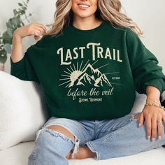 🌲Celebrate your bachelorette adventure with our cozy "Last Trail Before The Veil" sweatshirt, perfect for a hiking-themed party. Made from soft, durable fabric, this sweatshirt will keep you warm and stylish on your unforgettable trek!🌲 ♡ PRODUCT: Unisex heavy blend crewneck sweatshirt is pure comfort. These garments are made from polyester and cotton. This combination helps designs come out looking fresh and beautiful. The collar is ribbed knit, so it retains its shape even after washing. There are no itchy side seams on these sweaters.  .: 50% cotton, 50% polyester .: Medium-heavy fabric  .: Loose fit .: Sewn-in label .: Runs true to size ♡ CARE INSTRUCTIONS: - Machine wash cold inside out on delicate cycle and lay flat to dry. Do not bleach/dry-clean. Do not iron directly onto the des Bridesmaid Sweatshirts, Sweatshirt Bachelorette, Witchy Tshirt, Custom Bridal Party Gifts, Engaged Af, Custom Crewneck, Custom Bachelorette, Trip Shirts, Bookish Merch