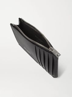 SAINT LAURENT's holder is a sleek way to keep your business and credit cards in check. Crafted from pebble-grain leather and fitted with a zipped pocket for coins, it is an everyday essential. Modern Business Card Holder With Zipper Closure, Modern Leather Coin Purse For Business, Modern Leather Card Holder With Zipper, Modern Leather Card Holder With Zipper Closure, Classic Business Card Holder With Zipper Closure, Modern Textured Leather Card Holder For Business, Modern Textured Leather Business Card Holder, Saint Laurent Collection, Leather Cardholder