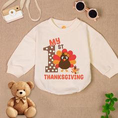 My 1St Thanksgiving Baby Romper Sweatshirt, Turkey Thanksgiving Baby Bodysuit, Fall Autumn Baby Clothes, Thanksgiving Baby Outfit - Handmade - Ships from USA - Materials: 100% CPSIA Compliant and Ethically Made material Light fabric (5.0 oz/yd² (170 g/m Crafted with soft, breathable fabric, this romper ensures your baby stays comfortable through playtimes and nap times alike. Featuring charming designs suitable for all babies, our romper is as adorable as it is practical. Quick Sizing Tip Our ro Long Sleeve Onesie For Birthday, White Long Sleeve Onesie For First Birthday, White Long Sleeve Tops For First Birthday, White Long Sleeve Onesie For Birthday, Thanksgiving Baby Outfit, 1st Thanksgiving, Thanksgiving Baby Outfits, Nap Times, M Craft