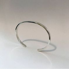 Plain Silver Cuff Bracelet - Etsy Modern Sterling Silver Cuff Bracelet Bangle, Modern Sterling Silver Open Cuff Bangle, Minimalist Silver Open Cuff Jewelry, Minimalist Cuff Bangle With Polished Finish, Classic Open Band Bangle As Gift, Minimalist Adjustable Bangle With Polished Finish, Adjustable Minimalist Bangle With Polished Finish, Simple Cuff Bangle Bracelet As Gift, Modern Sterling Silver Stackable Bangle