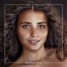 a woman with freckles on her face and chest is posing for the camera