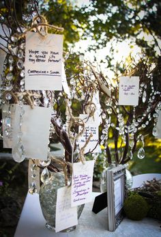 a table topped with lots of cards and trees