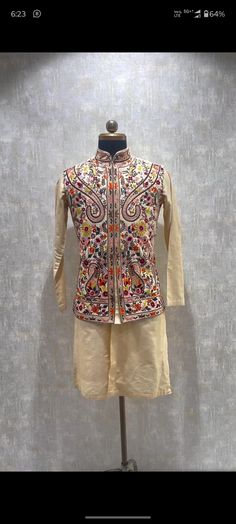 *3 Piece Cream :- Kurta , Pant, and Koti  *Fabric: %100  Cotton &  Silk  , Thick, Warm, Comfortable, Breathable, Softer, Satin Feeling *Center Hide Button with Hooks, With  Pants Stylish Pajama With Double Pocket *This Suit Has A 6" Drop Which Is The Difference Between The Size Of The Sherwani & Pants. For Example, A 40r Jacket Includes A 34W Pant *Dry Clean Only Important Note: All Our Products Are Made To Order ! Please Contact Us For Perfect Fitting Suit. .Full Lining Nehru Jacket With Kurta Festive Multicolor Nehru Jacket With Chikankari Embroidery, Resham Embroidered Nehru Jacket For Diwali, Cotton Nehru Jacket With Multicolor Embroidery And Zari Work, Traditional Embroidered Outerwear For Diwali, Diwali Multicolor Resham Embroidered Nehru Jacket, Traditional Outerwear With Chikankari Embroidery For Diwali, Festivals Nehru Jacket With Resham Embroidery And Stand Collar, Traditional Sets With Intricate Embroidery And Stand Collar, Traditional Set With Intricate Embroidery And Stand Collar