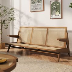 a wooden bench sitting on top of a hard wood floor next to a potted plant