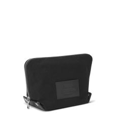 The Large Fold Out Cosmetic Case features a unique zip around closure with snaps that allows you to lay the case completely flat for a bird’s eye view of all your essentials, from cosmetics to toiletries. | Shinola Women's Large Fold Out Cosmetic Case in Black Canvas Luxury Travel Coin Purse With Zipper, Classic Compact Bag With Zipper Closure, Black Rectangular Travel Clutch, Leather Rectangular Cosmetic Bag With Zipper, Leather Rectangular Cosmetic Bag, Modern Travel Pouch With Case Included, Black Leather Cosmetic Bag With Zipper, Black Zipper Pouch Clutch For Travel, Black Clutch With Zipper Pouch For Travel