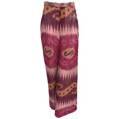 Ralph Laurent Collection, silk ikat printed wide leg trouser in silk chiffon. Beautiful and perfect for any occasion. Fly front, banded waist with button closure. Wide full legs. Sheer and unlined. Marked size 2. In excellent wearable condition. All our clothing is dry cleaned and inspected for condition and is ready to wear. Any condition issues will be noted. For visual comparison our mannequin is a size 4. Please check the measurements provided below and compare with your own measurements for Elegant Multicolor Silk Bottoms, Elegant Ralph Lauren Wide-leg Pants, Chic Ralph Lauren Wide-leg Pants, Ralph Lauren Summer Pants, Bohemian Silk Wide-leg Pants, Bohemian Silk Wide Leg Pants, Bohemian Wide Leg Silk Pants, Elegant Ralph Lauren Spring Pants, Ralph Laurent