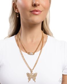 Featuring white rhinestones, an oversized gold butterfly pendant flutters from a white rhinestone-encrusted bail clasp, attached to the lowermost strand of a duo of gold curb chains. Dramatic gold curb chain links, featuring an emerald-cut white gem with a border of white rhinestones layers above the bedazzled butterfly for a radiantly layered finish. Features an adjustable clasp closure.   Sold as one individual necklace. Includes one pair of matching earrings. Luxury Yellow Necklaces For Women, Luxury Yellow Gold Necklaces For Anniversary, Luxury Sparkling Yellow Gold Necklace, Luxury Yellow Gold Charm Necklaces For Formal Occasions, Luxury Gold Necklaces With Cut Dana, Bedazzled Butterfly, Gold Curb Chain, Gold Jewelry Necklace, Virtual Stylist