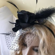 Fascinator Hat, Black Velvet, Silk Roses, Stripped Goose Feathers, a Marabou Wispy Feather. Head Band and Hair Clip. Black Bird Cage Veil. This fascinator is fun to add to your hairdo for any special occasion or just to dress up your look. Wear in your hair or on a hat for a glamorous touch. Floral Arrangement Adjusts on Headband. Remove from headband and clip into hair. For other vintage and homemade items see: www.VeryVictorianStudio.etsy.com For sewing related items see my other shop: www.Sew Vintage Black Fascinator For Party, Elegant Halloween Fascinator, Fitted Black Hat For Royal Ascot, Fitted Black Costume Hat For Royal Ascot, Black Hair Accessories For Spring Evening Events, Black Hair Accessories For Evening In Spring, Vintage Black Headpieces For Parties, Vintage Black Headpieces For Costume Party, Black Spring Headband Hats