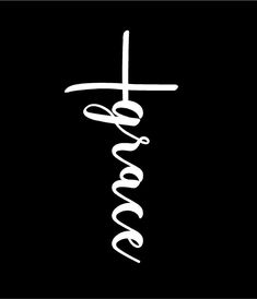 a cross with the word jesus written in white on a black background, as if it were handwritten