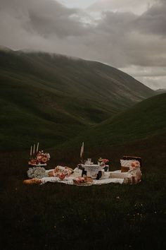 a table set up in the middle of a field